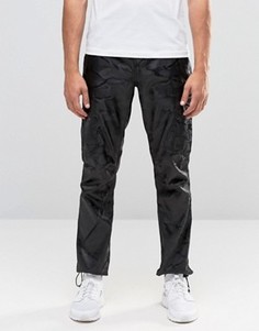 Черные прямые брюки с камуфляжным принтом ASOS - Черный