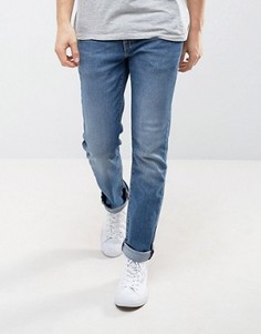 Умеренно выбеленные джинсы слим Levis 511 Rocky Strong - Синий
