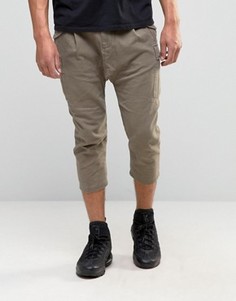 Укороченные брюки в стиле карго с заниженным шаговым швом ASOS - Коричневый