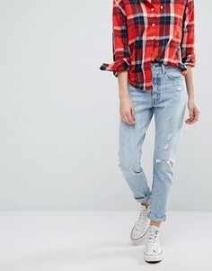 Зауженные джинсы с потертостями Levis 501 - Синий