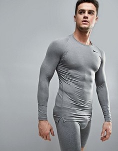 Серый лонгслив Nike Training Compression 703088-091 - Серый
