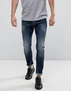 Выбеленные зауженные джинсы с потертостями United Colors of Benetton - Синий