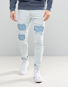 Выбеленные супероблегающие джинсы с рваной отделкой ASOS - Синий