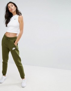 Спортивные штаны хаки классического кроя Nike Rally - Зеленый