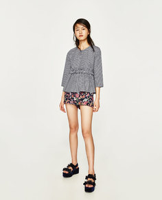 Блуза в клетку с воланом Zara
