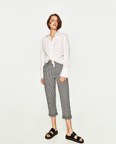 Брюки в клетку Zara