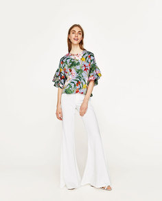 Брюки расклешенные Zara