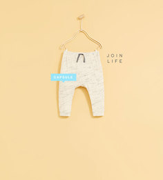 Брюки с меланжевым эффектом Zara