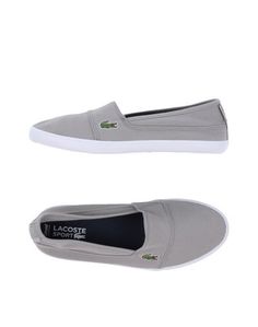 Низкие кеды и кроссовки Lacoste