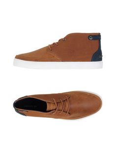 Высокие кеды и кроссовки Lacoste