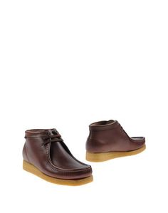 Полусапоги и высокие ботинки Sebago