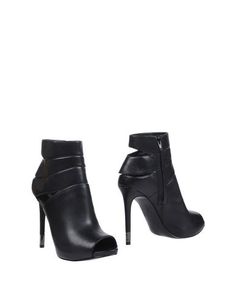 Полусапоги и высокие ботинки Guess