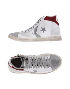 Высокие кеды и кроссовки Converse