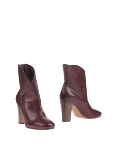 Полусапоги и высокие ботинки CÉline