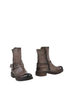 Полусапоги и высокие ботинки Manas