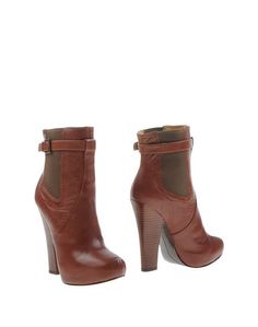 Полусапоги и высокие ботинки Nine West