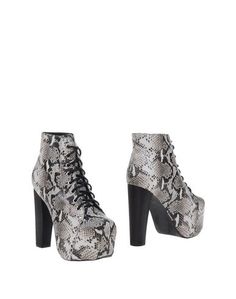 Полусапоги и высокие ботинки Jeffrey Campbell