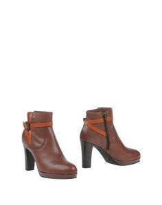 Полусапоги и высокие ботинки Manas