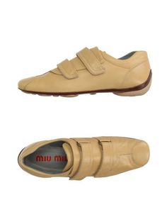 Низкие кеды и кроссовки MIU MIU