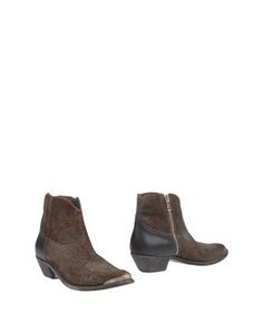 Полусапоги и высокие ботинки Golden Goose