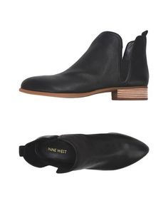 Полусапоги и высокие ботинки Nine West