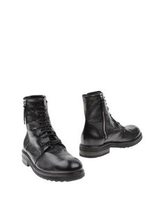 Полусапоги и высокие ботинки Halmanera