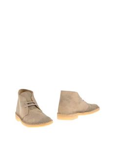 Полусапоги и высокие ботинки Clarks