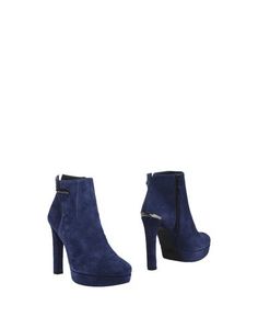 Полусапоги и высокие ботинки Stuart Weitzman