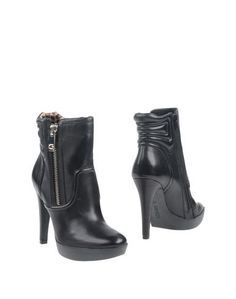 Полусапоги и высокие ботинки Guess