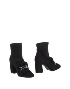 Полусапоги и высокие ботинки Stuart Weitzman
