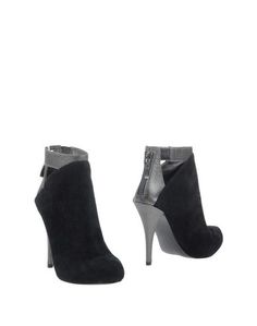 Полусапоги и высокие ботинки Guess