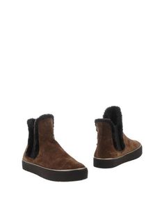 Полусапоги и высокие ботинки Stuart Weitzman