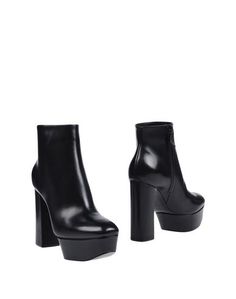 Полусапоги и высокие ботинки Casadei