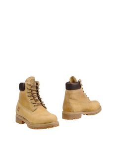 Полусапоги и высокие ботинки Timberland
