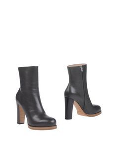 Полусапоги и высокие ботинки CÉline