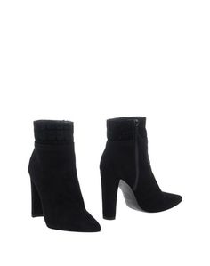 Полусапоги и высокие ботинки Stuart Weitzman