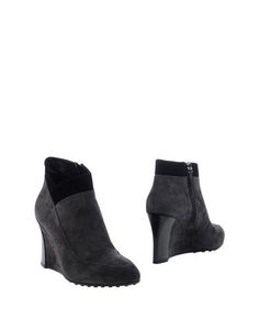 Полусапоги и высокие ботинки Tod’S