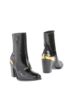 Полусапоги и высокие ботинки CÉline