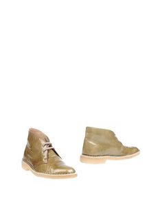 Полусапоги и высокие ботинки Clarks