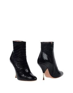 Полусапоги и высокие ботинки Rochas