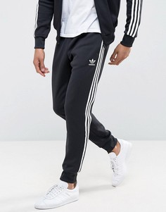 Спортивные штаны с манжетами adidas Originals Superstar AJ6960 - Черный