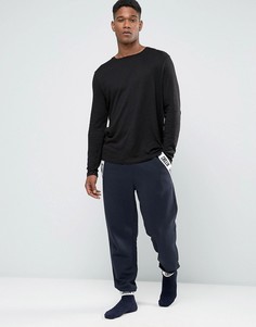 Джоггеры скинни с принтом Chillin на полоске по бокам ASOS - Темно-синий