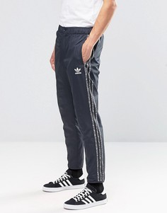 Серые джоггеры с логотипом adidas Originals AY8363 - Серый
