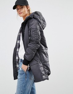 Длинная дутая куртка с подкладкой из искусственного меха на капюшоне Converse - Черный