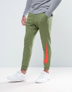 Зауженные облегающие джоггеры с манжетами зеленого цвета 831816-387 - Зеленый Nike