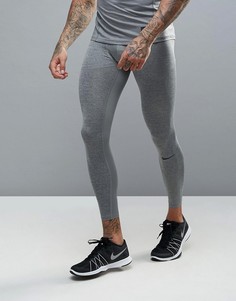 Серые спортивные компрессионные колготки Nike 703098-091 - Серый