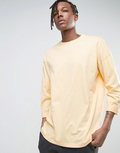 Желтый oversize-лонгслив с закатанными рукавами ASOS - Желтый