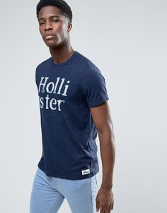 Темно-синяя узкая меланжевая футболка с большим логотипом Hollister - Темно-синий