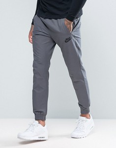 Серые джоггеры с вышитым логотипом Nike 804325-021 - Серый