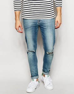 Ультразауженные джинсы скинни с рваными коленями ASOS - Синий